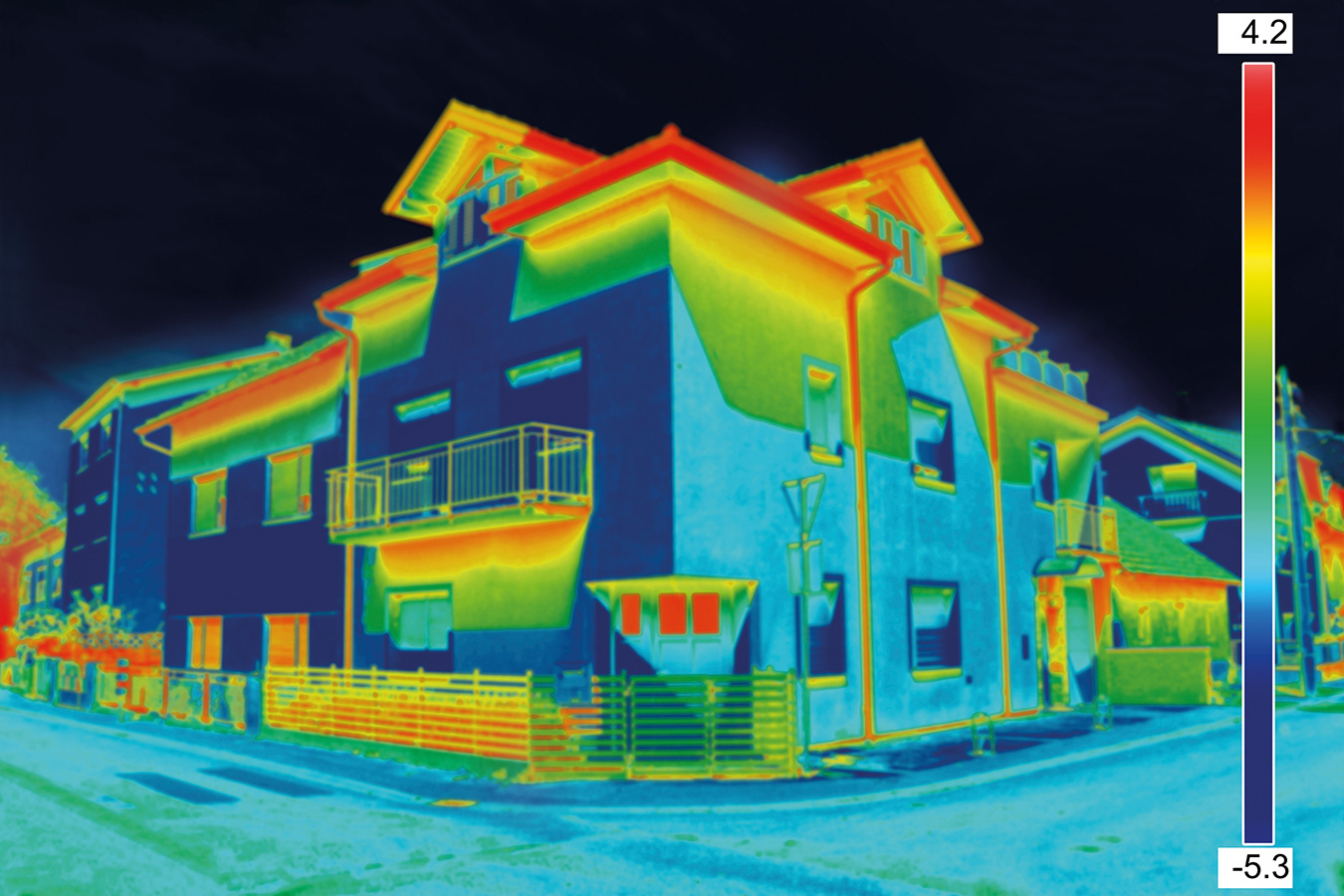 Thermovision image of two-story houses in a neighborhood Thermovision image of two-story houses in a neighborhood
